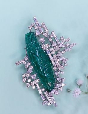 synthetic carved emerald brooch