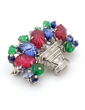 colorful carved gemstone brooch